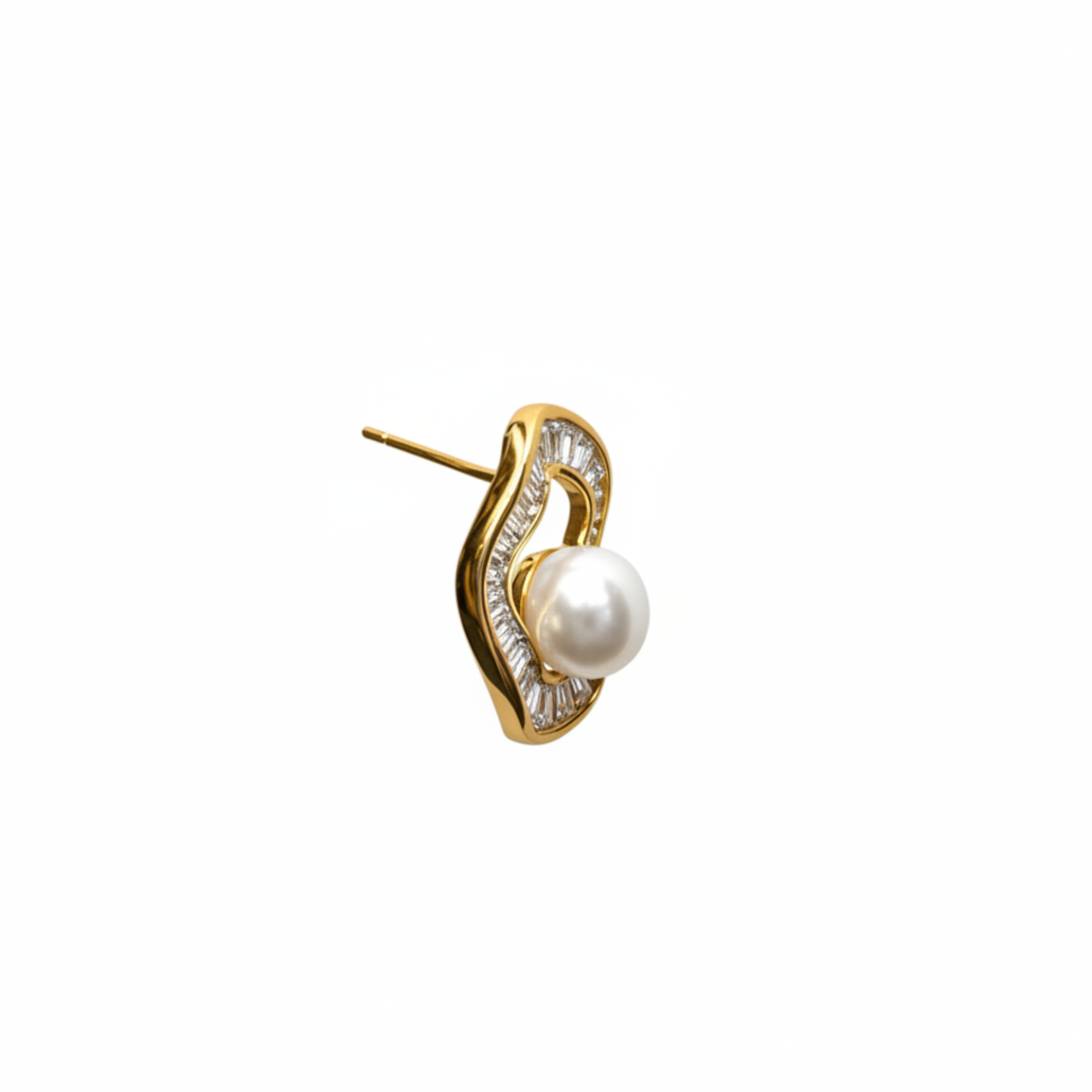 A single gold earring featuring a curved, openwork design paved with small clear stones and a central white pearl, shown against a plain light beige background.