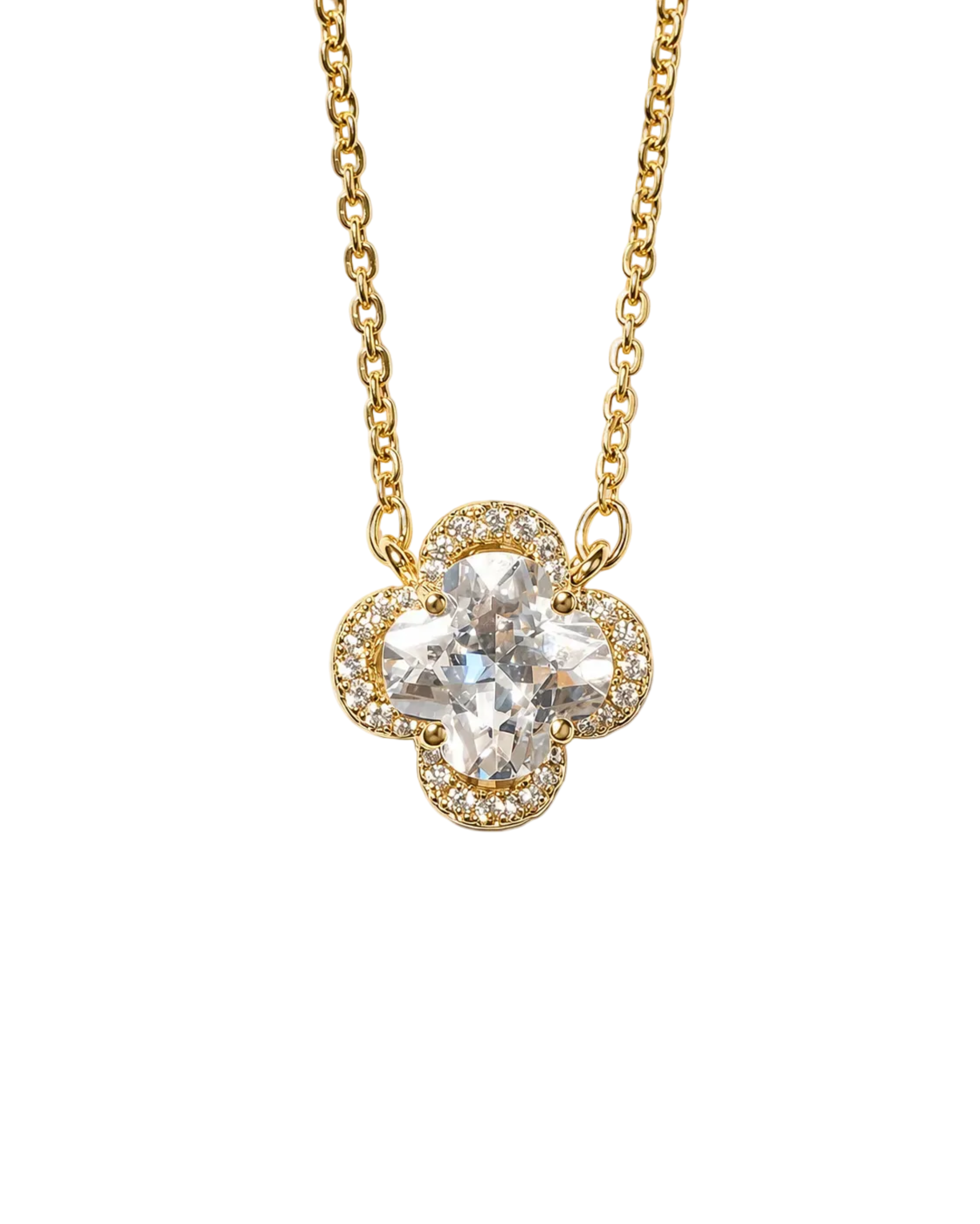 A gold-tone floral pendant necklace featuring a large clear central gemstone surrounded by a halo of small clear stones, suspended from a delicate gold chain on a light cream background.