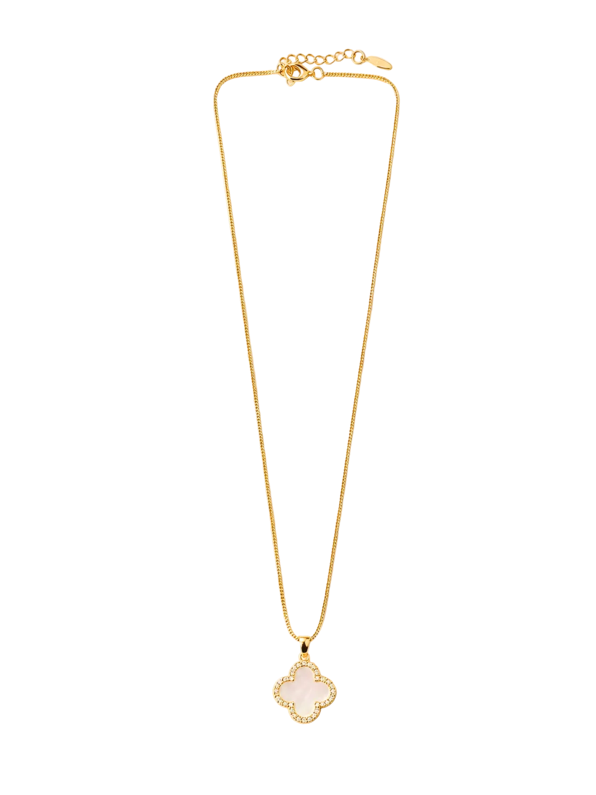 A gold-tone chain necklace with a clover-shaped pendant featuring a pale pink center and a border of small clear stones, displayed on a light cream background.