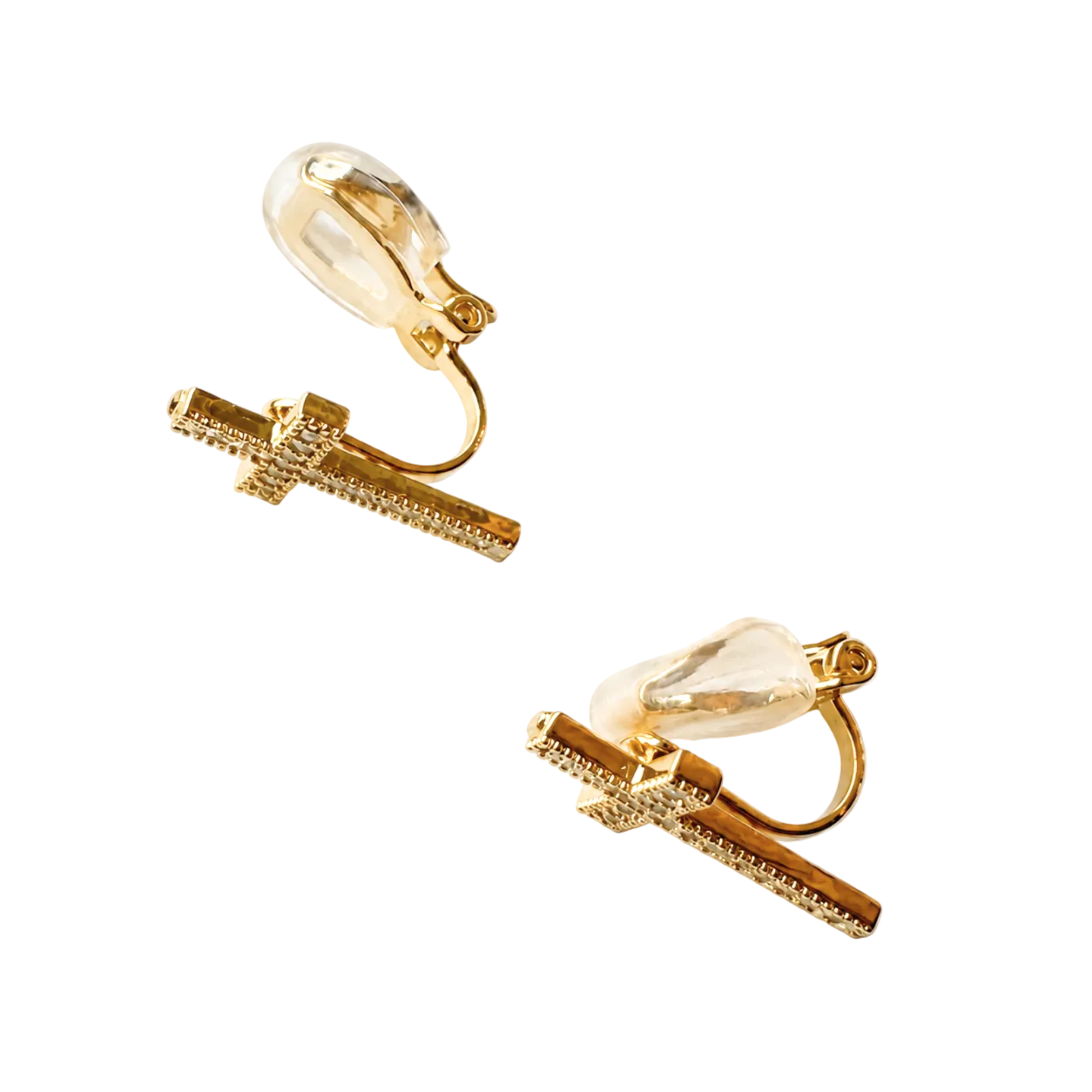 A pair of gold-toned clip-on earrings with a barbell-style front and a clear teardrop-shaped crystal back, shown on a plain white background.