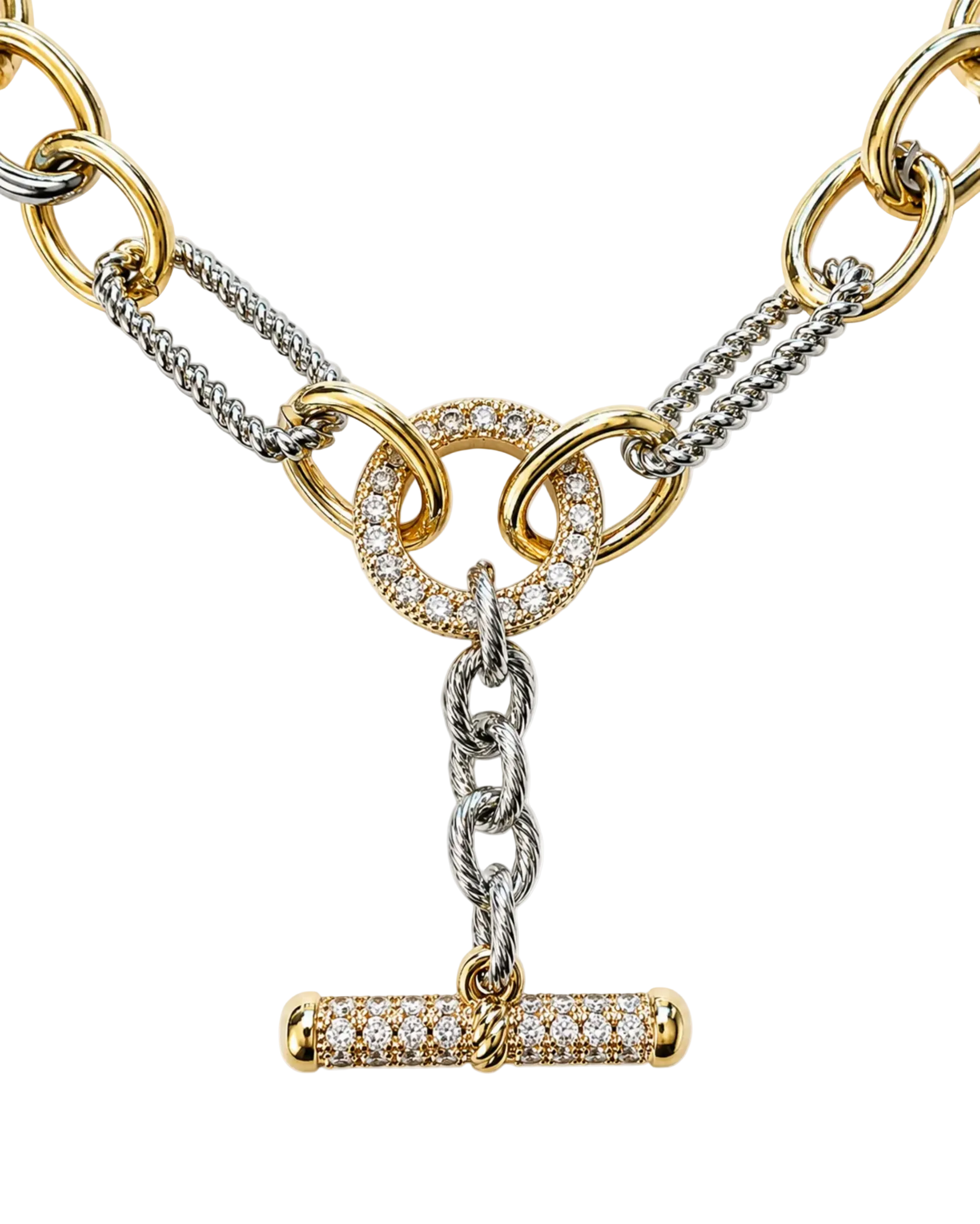 A close-up of a luxury chain necklace featuring a mix of yellow gold and silver-tone links, with a central gold ring paved with clear stones and a matching gold bar pendant paved with small clear stones, set against a plain white background.