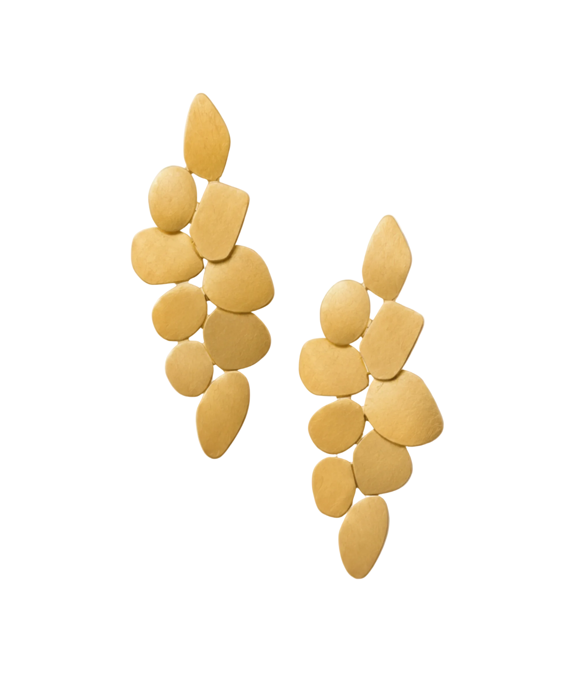 A pair of gold-toned dangle earrings with a layered, organic leaf or petal-like design, displayed on a clean, light beige background.