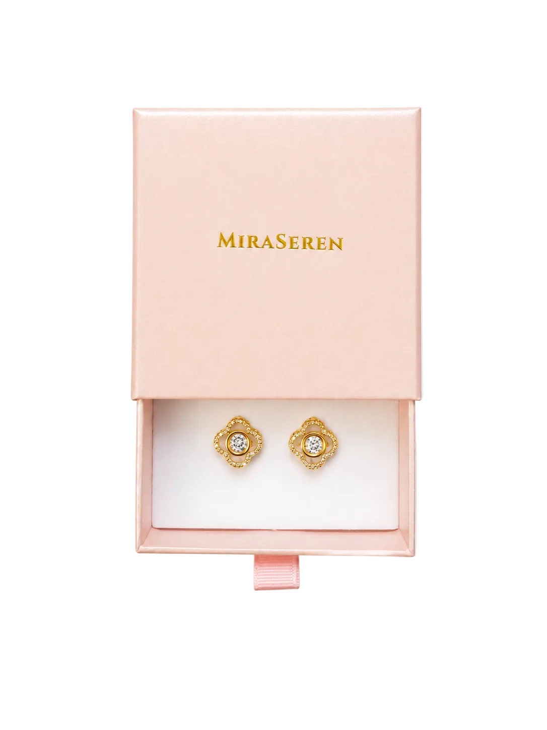 A pair of gold floral stud earrings with clear gemstones, presented in a pink Miraseren jewelry box on a white background.